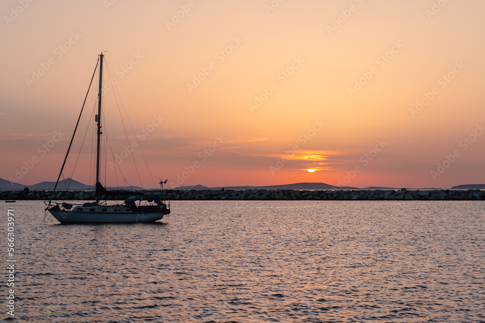 Naxos sunset with sailboat