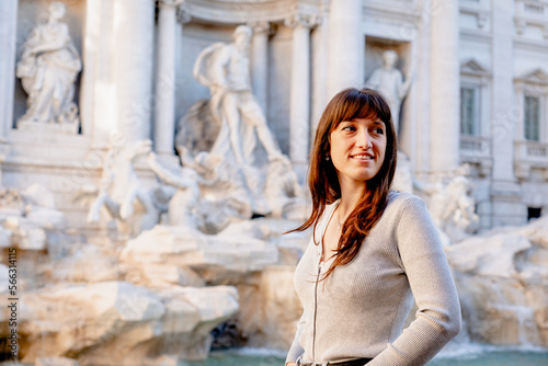 portrait of travel woman visiting di Trevi fountain in Rome