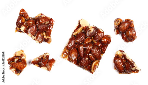 Tableau sur toile Almond caramelized nut, pieces candied bar isolated on white, top view