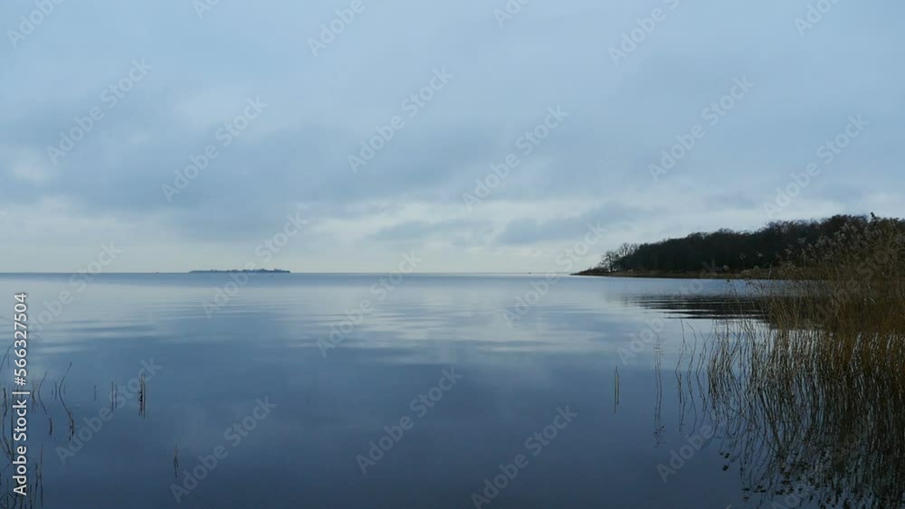smooth water on the lake, quiet autumn evening, picturesque landscape smooth water on the lake, quiet autumn evening, picturesque landscape