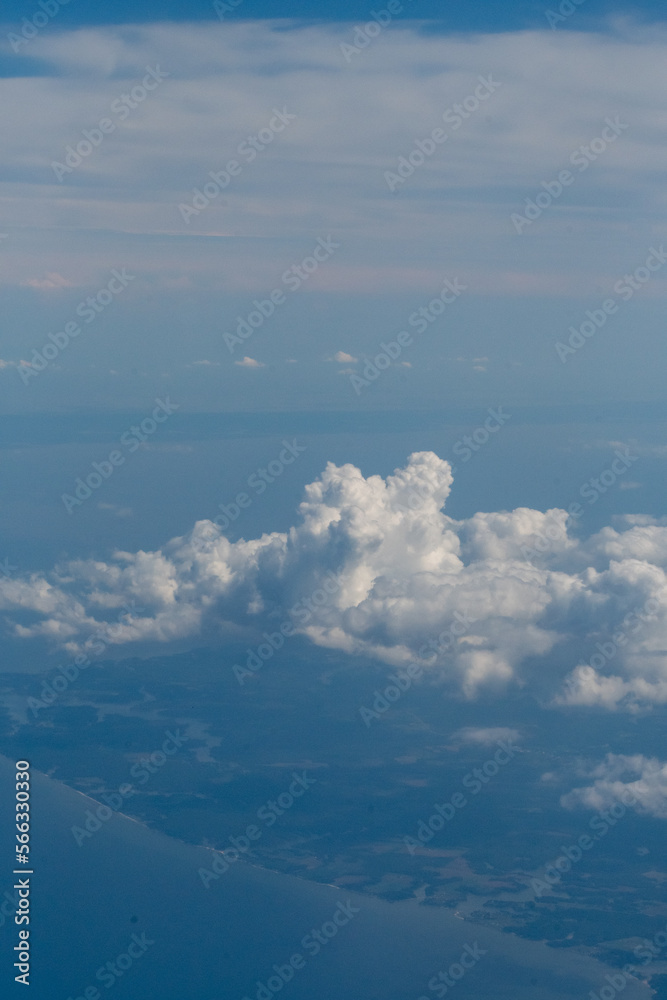 Fototapeta premium White clouds and blue sky in this aerial photograph of clouds