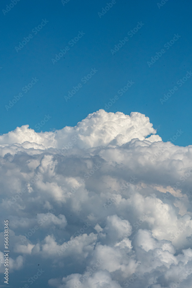 White clouds and blue sky in this aerial photograph of clouds White clouds and blue sky in this aerial photograph of clouds