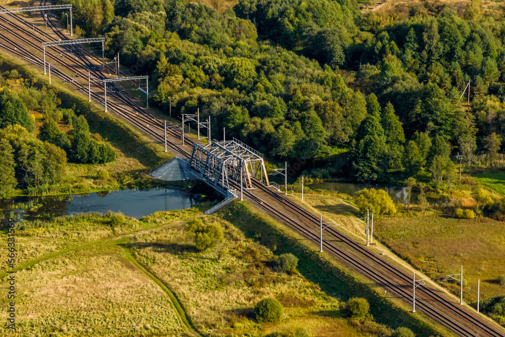 aerial panoramic view on steel frame construction of huge train railway bridge across river aerial panoramic view on steel frame construction of huge train railway bridge across river