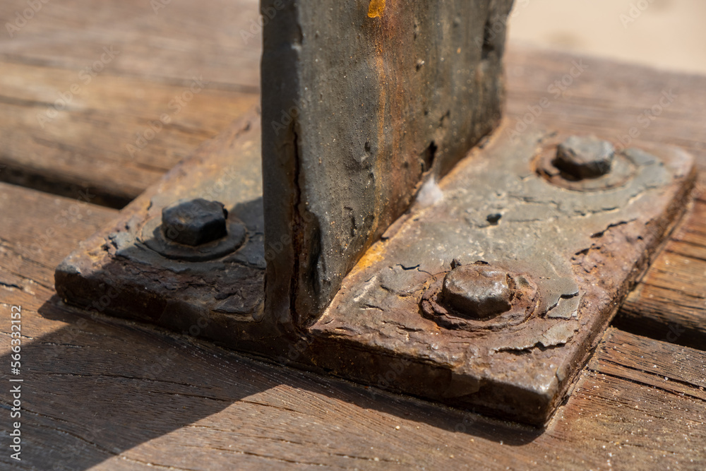 Corrosive rusty bolt close-up. Wood and metal are susceptible to rust Corrosive rusty bolt close-up. Wood and metal are susceptible to rust