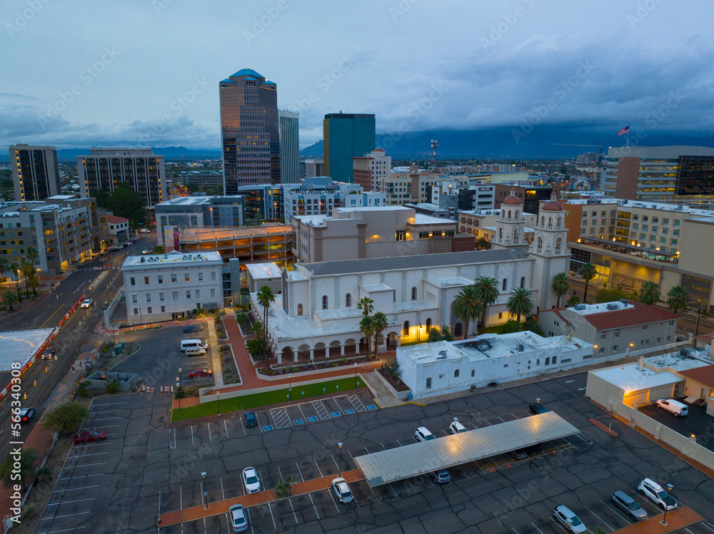 Fototapeta premium St. Augustine Cathedral and Tucson skyscrapers at sunset including One South Church, Bank of America Plaza and Pima County Legal Services Building in downtown Tucson, Arizona AZ, USA. 