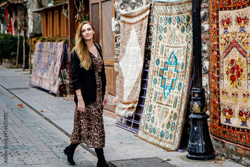 Canvas Print Woman travel on streets in Istanbul near Hagia Sophia famous islamic Landmark mosque, Travel to Istanbul, Turkey background