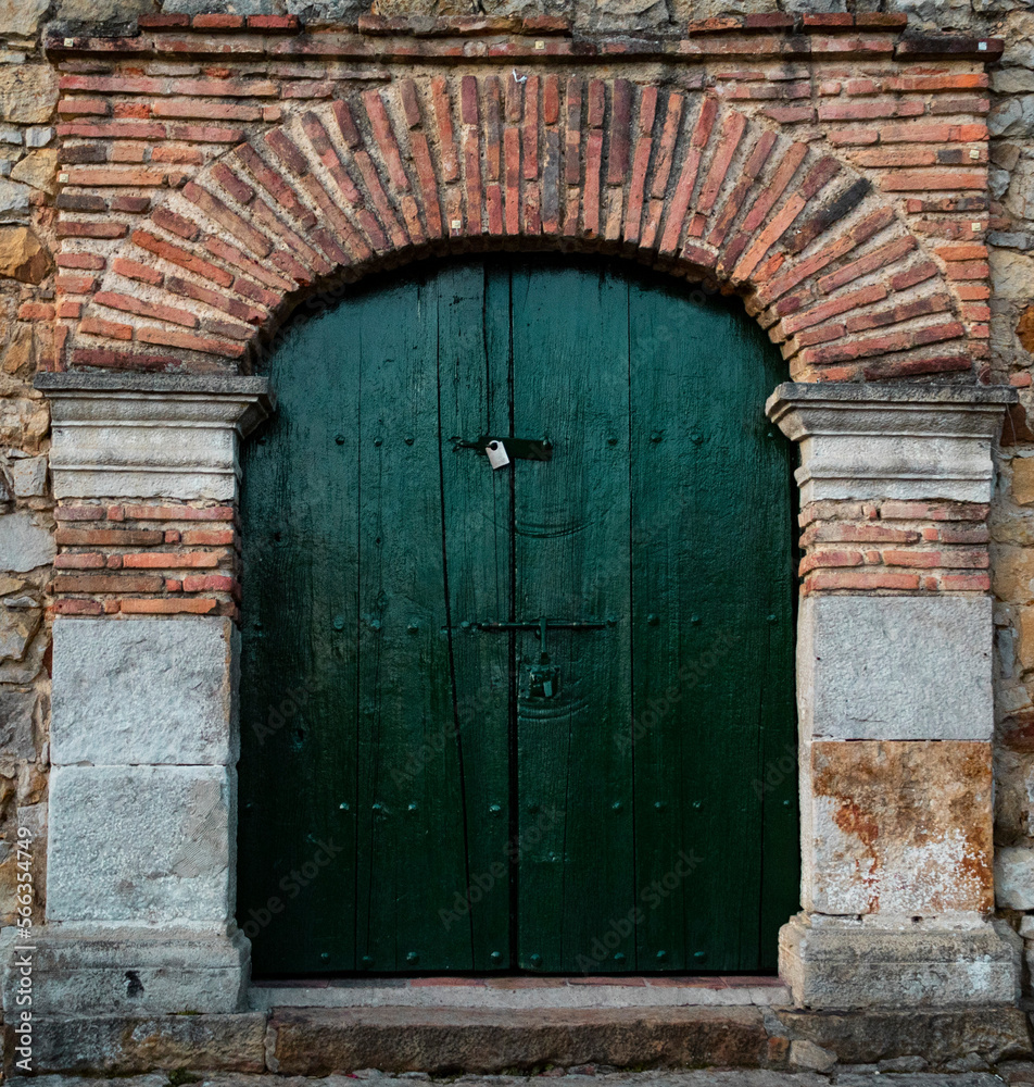 old wooden arch door