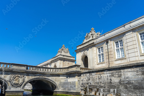 Bas-relief in form of profile of man with beard in oval on bridge in Copenhagen, Denmark. Decor elements of bridge in Copenhagen. City decorations photo