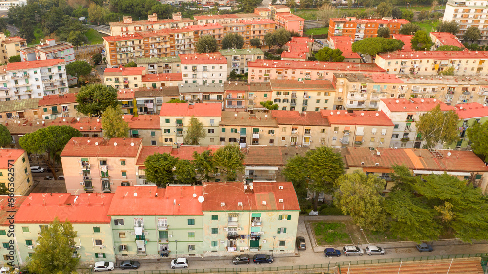 Aerial view of tenement buildings built in a row. Buildings for residential use in Italy.