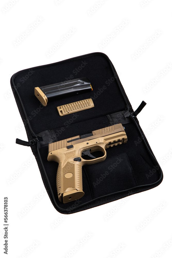 Modern semi-automatic pistol isolate on a white back. Armament for the army and police. Short-barreled coyote-colored weapon. Modern semi-automatic pistol isolate on a white back. Armament for the army and police. Short-barreled coyote-colored weapon.