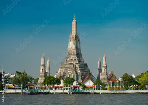 Morning at Wat Arun temple. View of the magnificent temple from the other side of the river. It is one of Thailand's most important travel destinations.