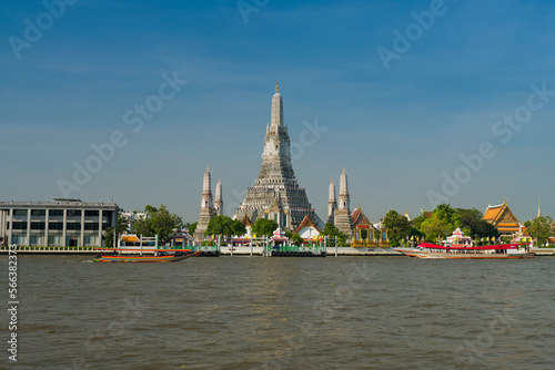 Morning at Wat Arun temple. View of the magnificent temple from the other side of the river. It is one of Thailand's most important travel destinations.
