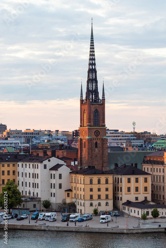Stockholm, Sweden - July 18th 2022: A view of the Riddarholmen Church of Stockholm's old town from above.