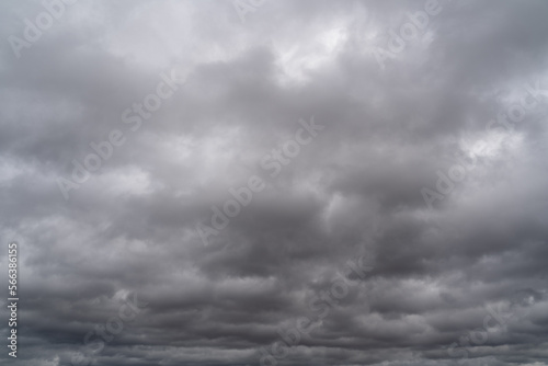Fototapeta Naklejka Na Ścianę i Meble -  Background with dark and gray cloudy sky in spring