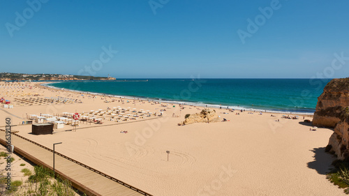 Beautiful view of the Praia da Rocha and  boardwalk along the beach. Portimao, Portugal