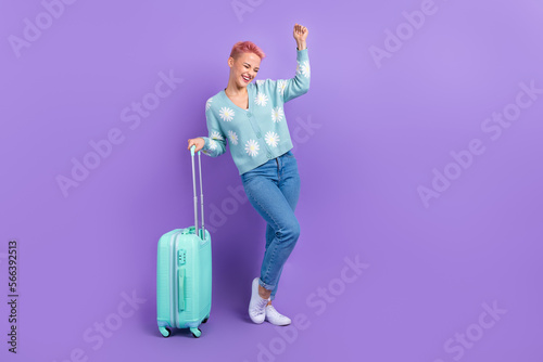 Full body size cadre of overjoyed woman fist up celebrate carefree satisfied finally summer holiday trip abroad isolated on violet color background