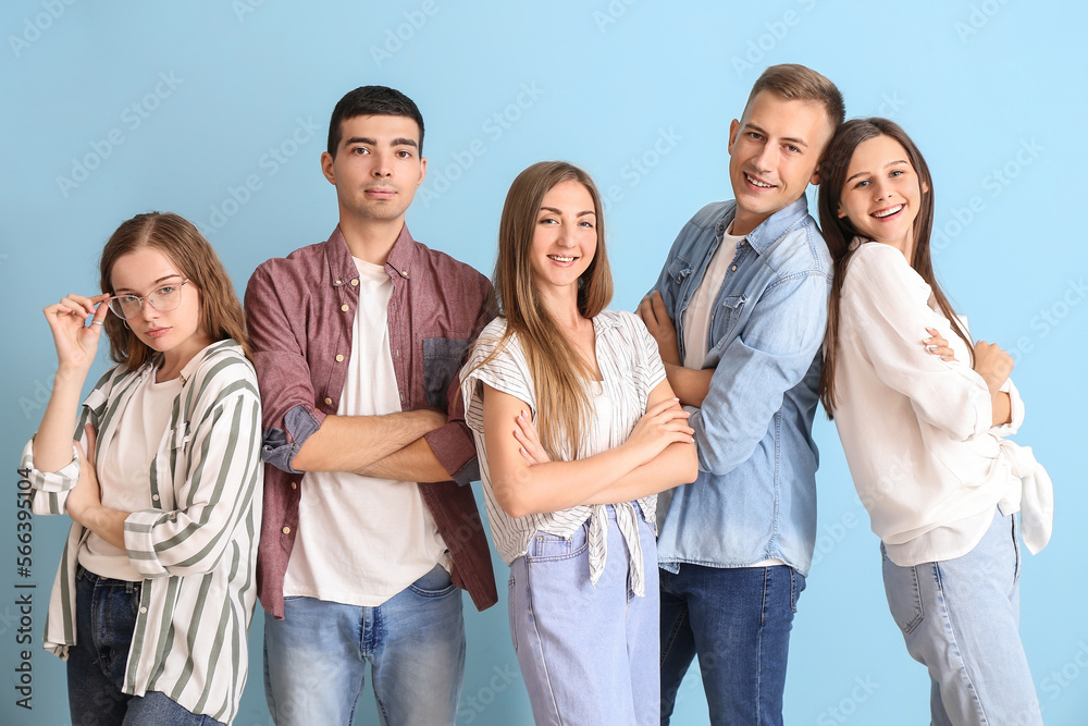 Group of happy friends on blue background Group of happy friends on blue background