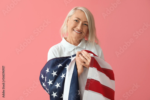 Mature woman with USA flag ...