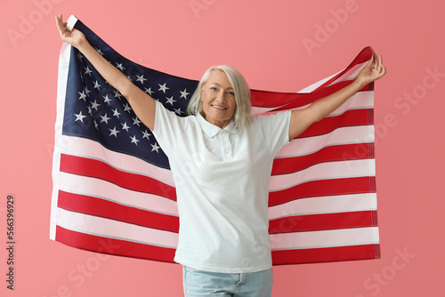 Mature woman with USA flag ...
