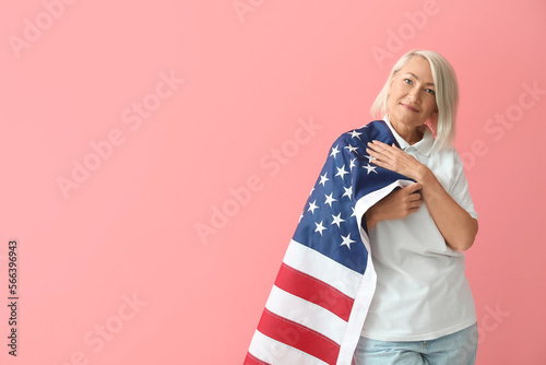 Mature woman with USA flag ...