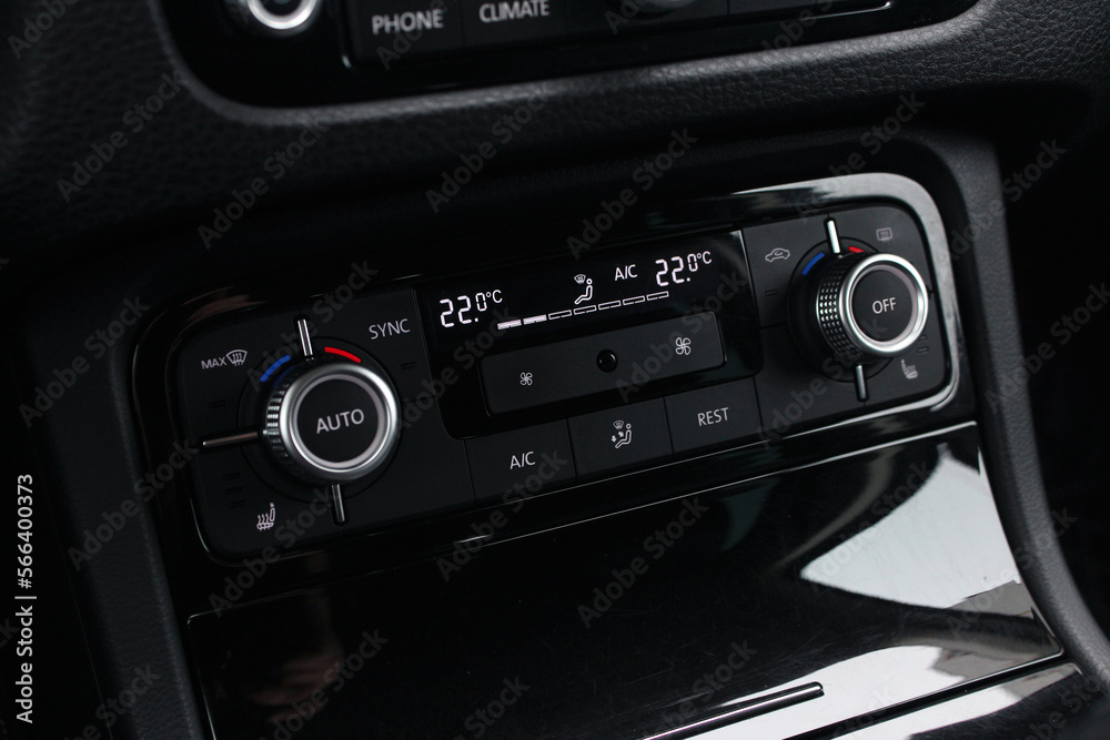 Modern car climate control panel for driver and passenger. Zone climate control. Car interior detail. Modern car climate control panel for driver and passenger. Zone climate control. Car interior detail.