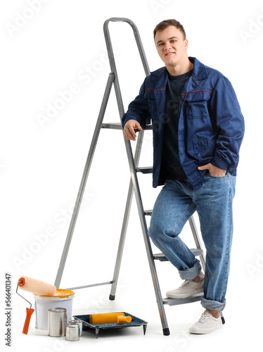 Young man with ladder and c...