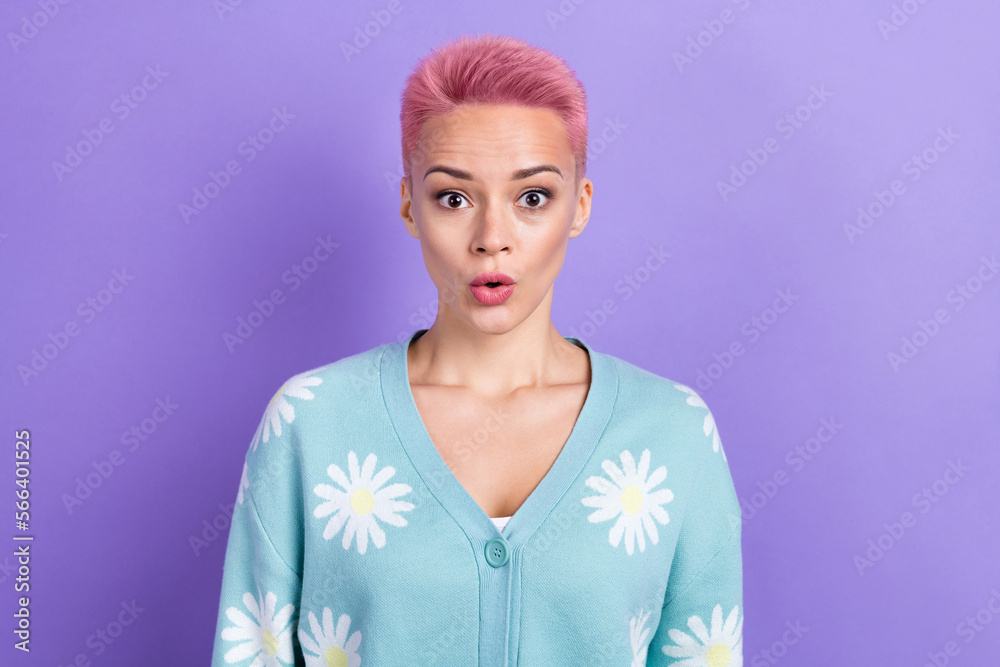 Portrait of positive cheerful impressed girl with pink hairdo wear blue pullover staring open mouth isolated on violet color background Portrait of positive cheerful impressed girl with pink hairdo wear blue pullover staring open mouth isolated on violet color background