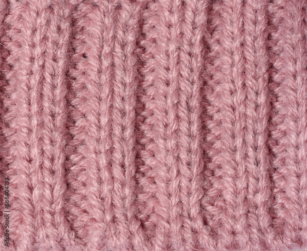 Texture of knitted pink fabric