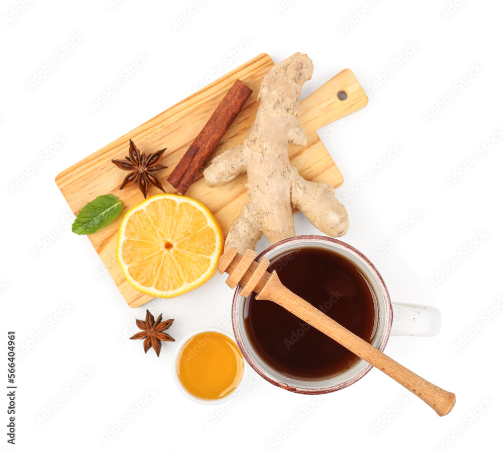 Board with ginger root, lemon, cinnamon and cup of black tea isolated on white background Board with ginger root, lemon, cinnamon and cup of black tea isolated on white background