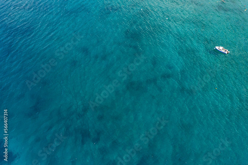 Shallow water and reef by 7 km long beach in village Borsh, Albania in Summer 2022 photo