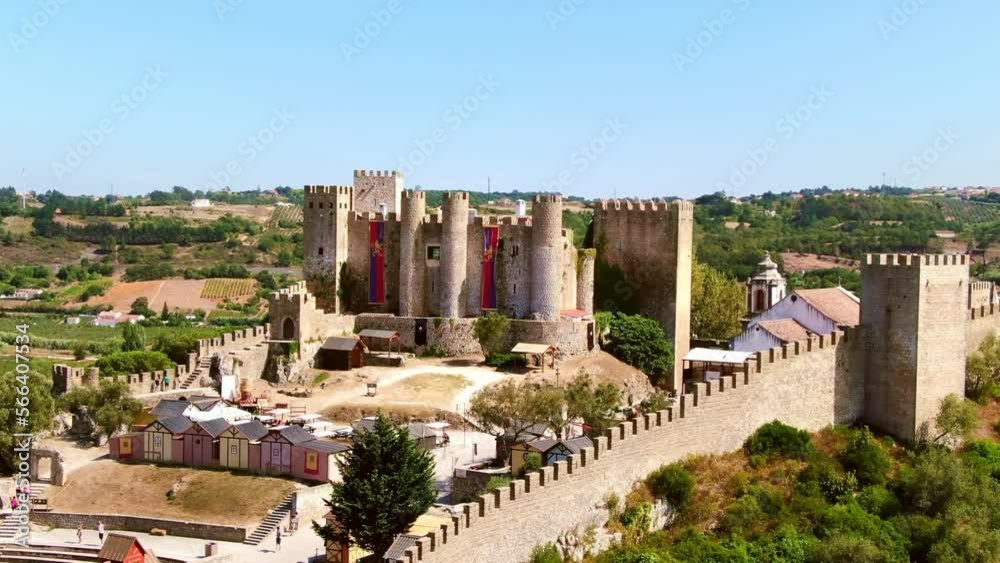 Drone Portugal 4k. Castle of Obidos and wall ruins or Castelo de Obidos medieval castle. Summer in Europe travel, famous tourism destination.