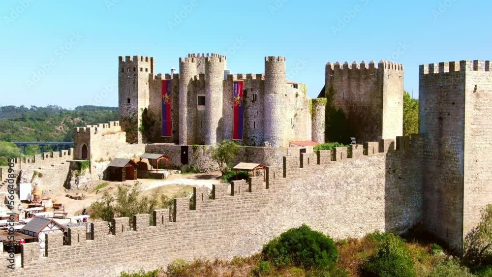 Drone Obidos 4k. medieval castle in Portugal. Castelo de Obidos. Summer in Europe travel, famous tourism destination.