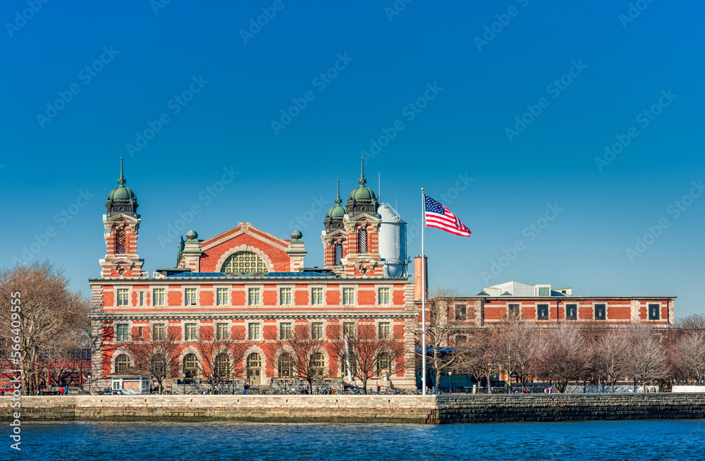 Museum on Liberty Island. USA. Waving USA Flag
