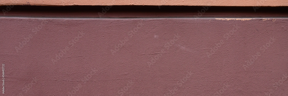 Fototapeta premium Decorative elements on the wall. Rough painted surface. Empty place for text, images and ads. Wide panoramic texture for background and design.
