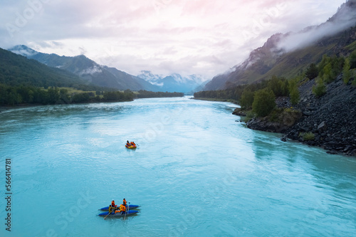 Team extreme rafting on red boat on stormy blue river Altai, Aerial top view. Concept adventure travel