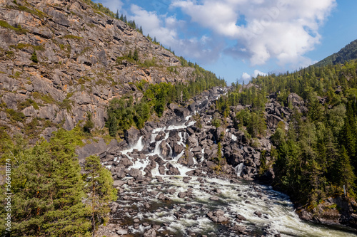 Summer landscape travel of Altai mountains Russia. Aerial view waterfall Uchar photo