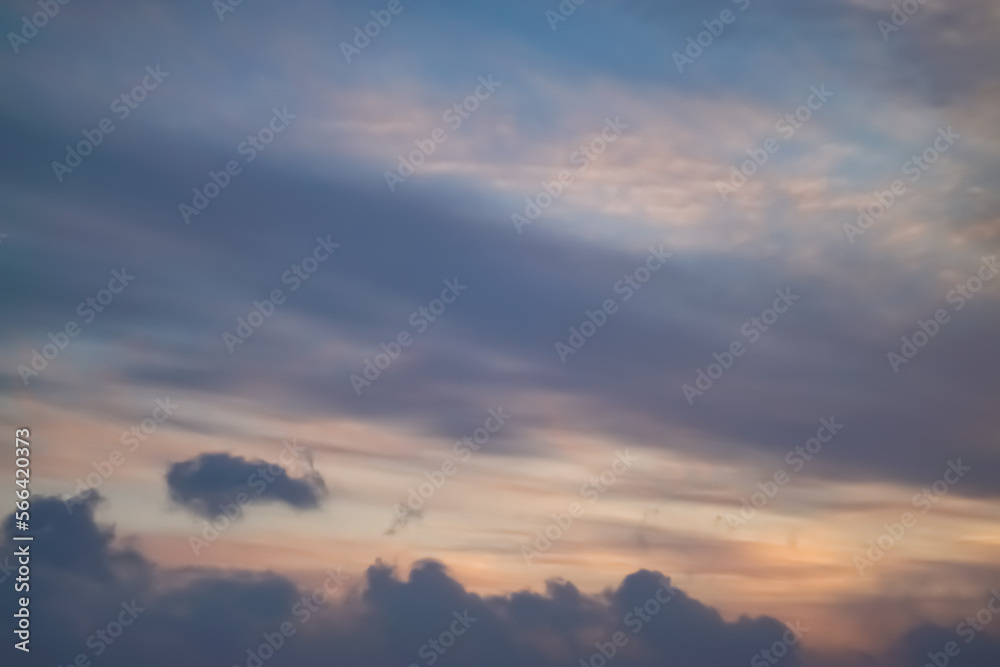Minimalistic sky with clouds and clouds at sunset, evening cloudy sky