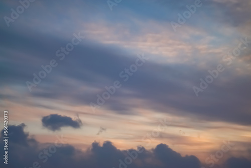 Minimalistic sky with clouds and clouds at sunset, evening cloudy sky