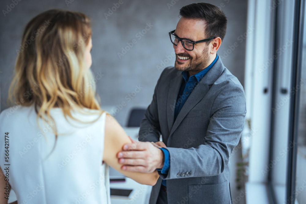 Recruiter shaking successful smiling businesswoman candidate hand at meeting, congratulating with getting new job, manager making great deal with customer, diverse business partners greeting Recruiter shaking successful smiling businesswoman candidate hand at meeting, congratulating with getting new job, manager making great deal with customer, diverse business partners greeting