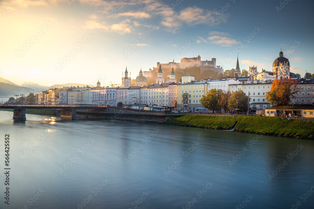 Beautiful view of Salzburg from Salzach River at misty sunrise, Austria