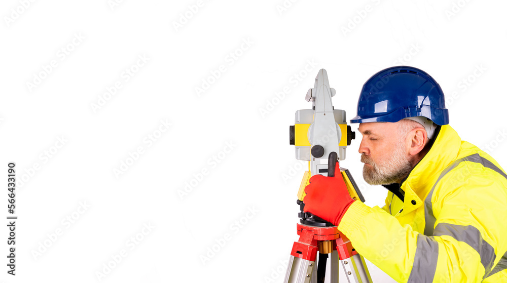 A builder engineer in a blue hat and yellow reflective coat on white background with space for text. Surveyor using modern surveying equipment isolate on white background A builder engineer in a blue hat and yellow reflective coat on white background with space for text. Surveyor using modern surveying equipment isolate on white background