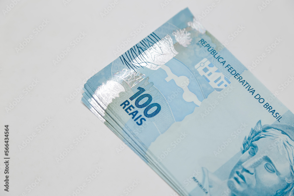 banknotes of one hundred reais on white background banknotes of one hundred reais on white background