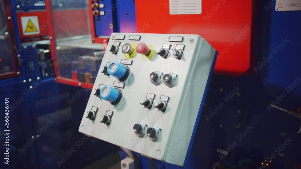 Machine Control Panel Overview Machine control panel with buttons for regulation in manufacturing ...