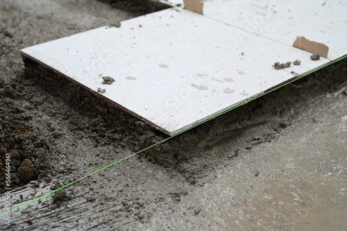 white tile and cement floor, construction industry
