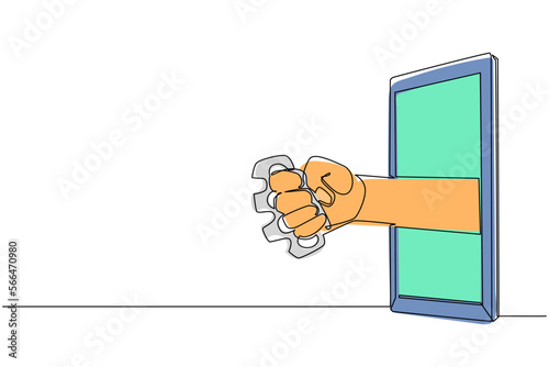 Continuous one line drawing hand holding brass knuckles through mobile phone. Concept of fighting video games, e-sport, entertainment application for smartphone. Single line draw design vector graphic