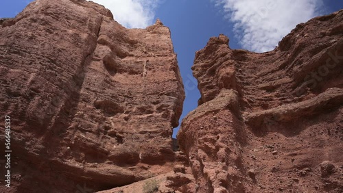 Charyn Canyon mountainside eroded texture, rotate pan left rough crumbly cliffs photo