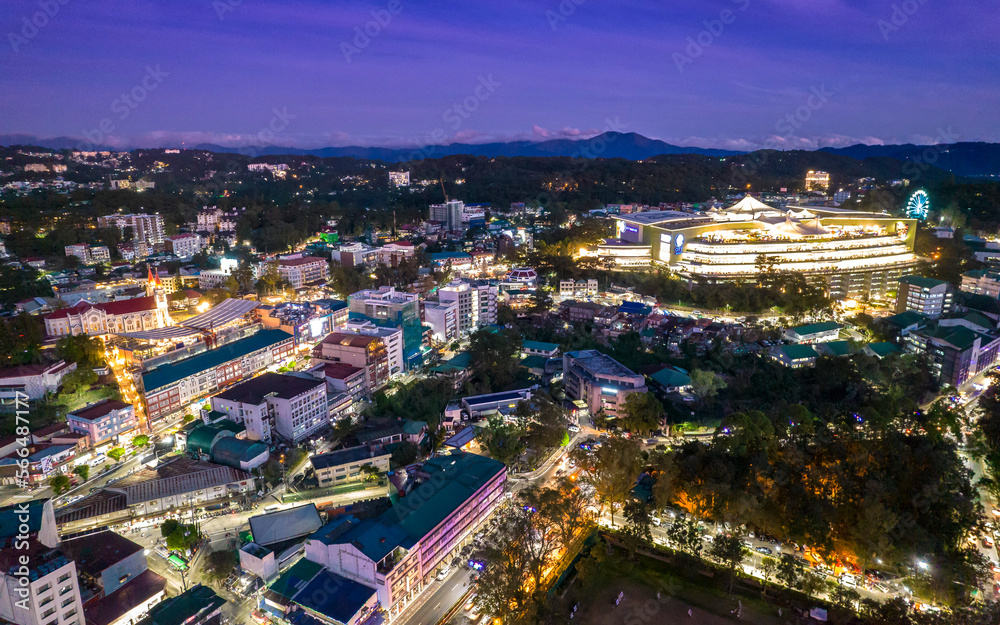 Baguio City, Philippines - Aerial of Baguio Catherdral, buildings along session road, and SM.