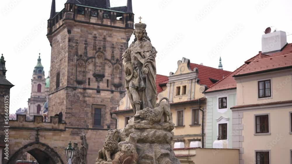 statues of Catholic saints on Prague Charles Bridge. Czech Republic historic landmark. Summer tourism travel destination in Europe. statues of Catholic saints on Prague Charles Bridge. Czech Republic historic landmark. Summer tourism travel destination in Europe.