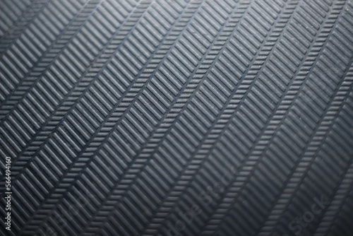black plastic with beautiful pattern background texture closeup