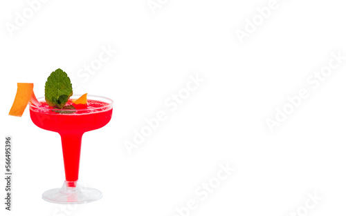 Coupe glass with red cocktail and garnish with fresh mint leaf isolated on white background.